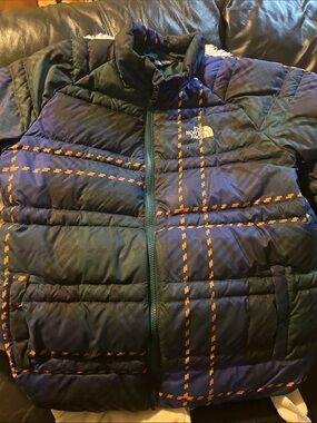 The North Face Navy Puffer Jacket with Orange Plaid Accents